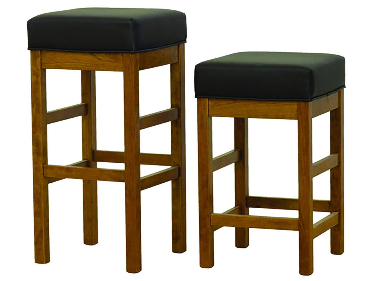 Pair of solid oak backless bar and counter stools with black leather square seats, double footrails and tapered legs