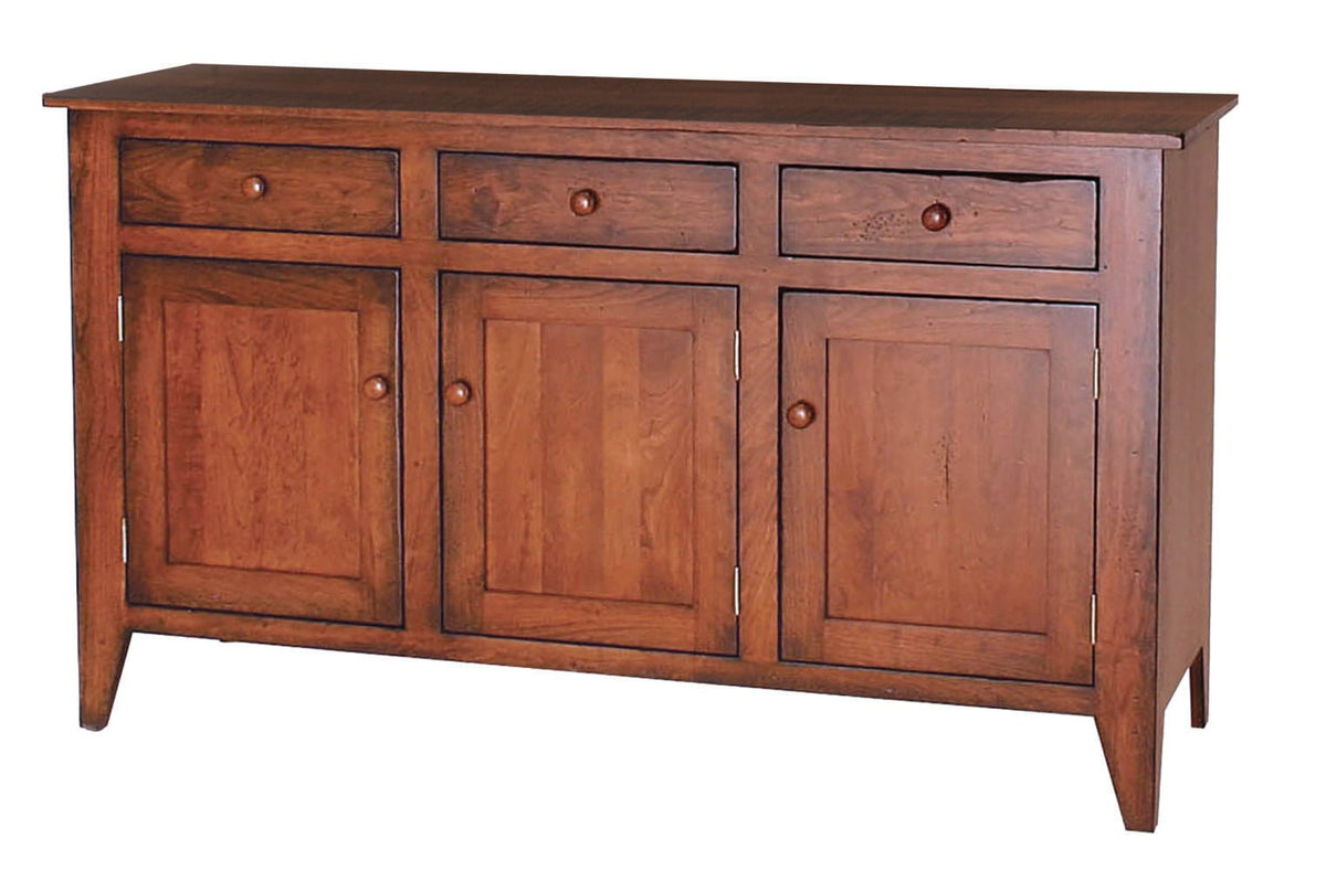 Shaker cherry sideboard buffet with three drawers over three paneled doors, round knobs and tapered legs