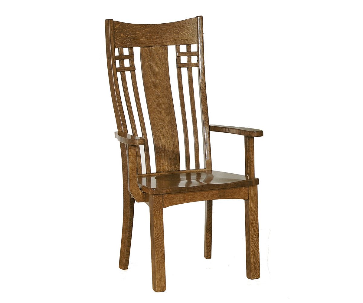 Quartersawn oak dining arm chair with a wide center splat, lattice details and a contoured wood seat