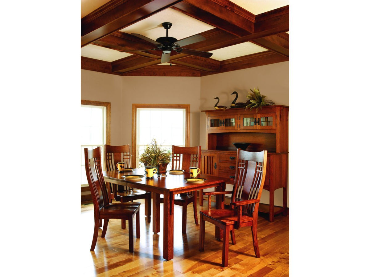 Craftsman dining space with the oak leg table, six lattice back chairs and a glass-door hutch