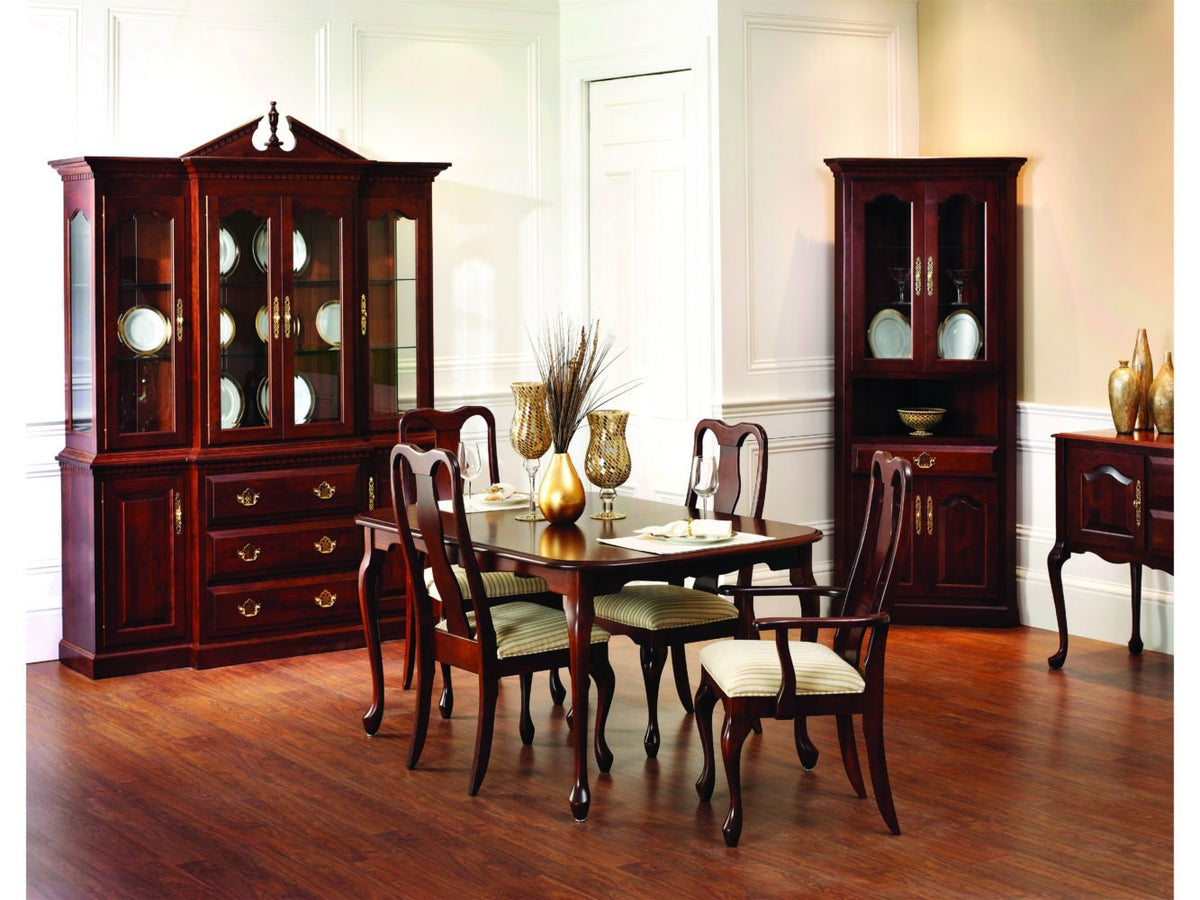 Formal cherry dining room with a pedimented china cabinet, corner hutch, Queen Anne table and upholstered chairs