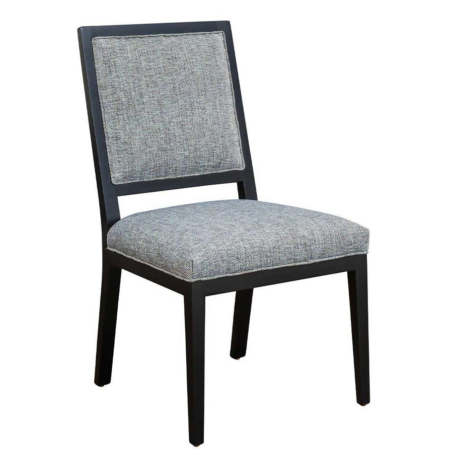 Contemporary dining chair with a square gray upholstered back panel and seat on a slim black wood frame, shown on white