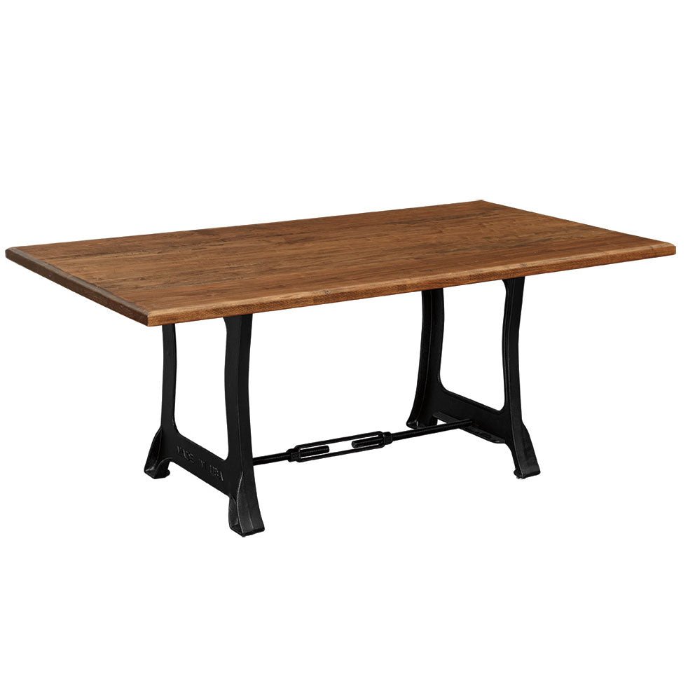 Cast iron base dining table with a warm honey plank top and A-frame legs with a tie rod stretcher