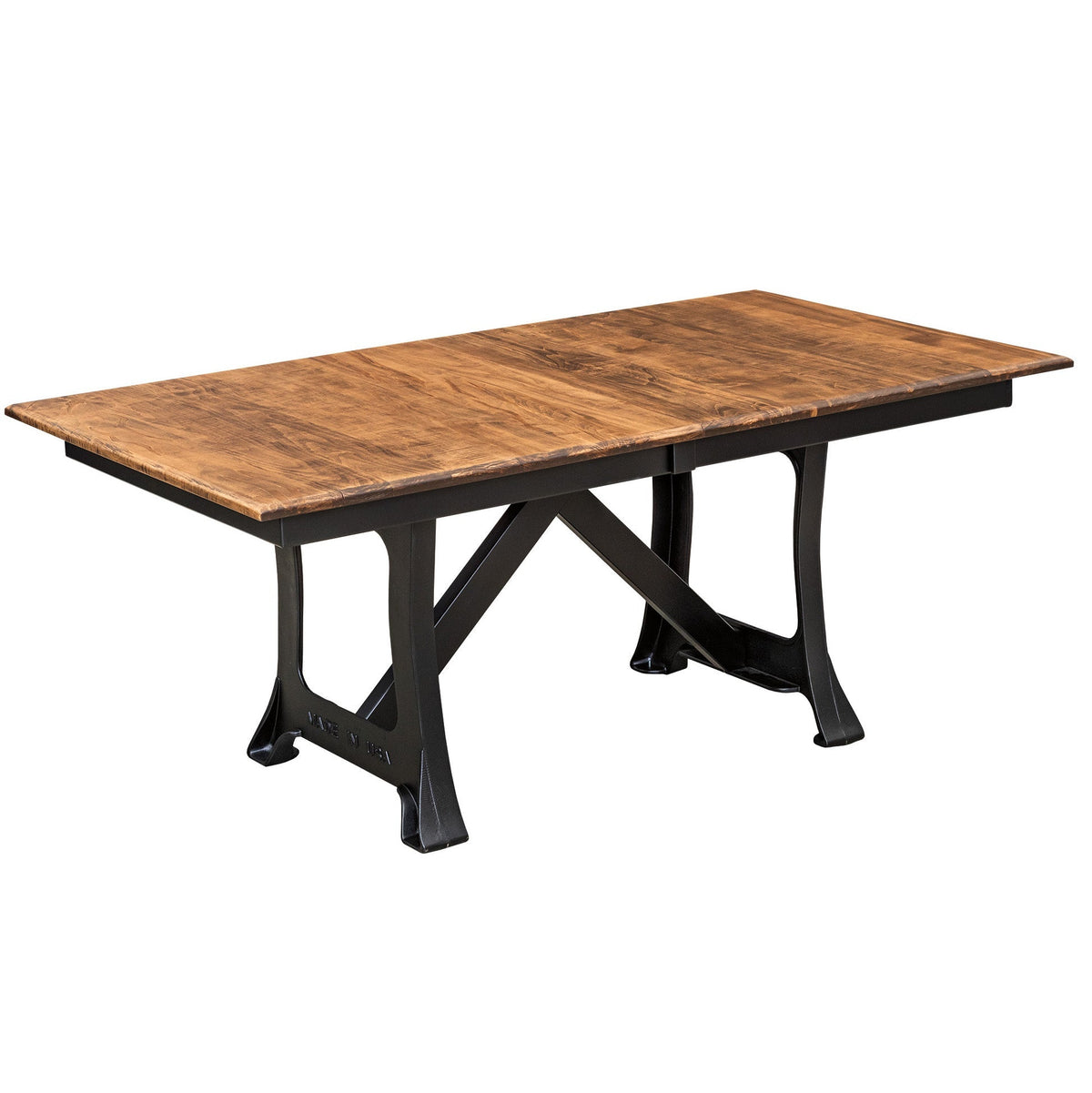 Cast iron pedestal extension dining table with a light rustic top, black legs and a center leaf seam