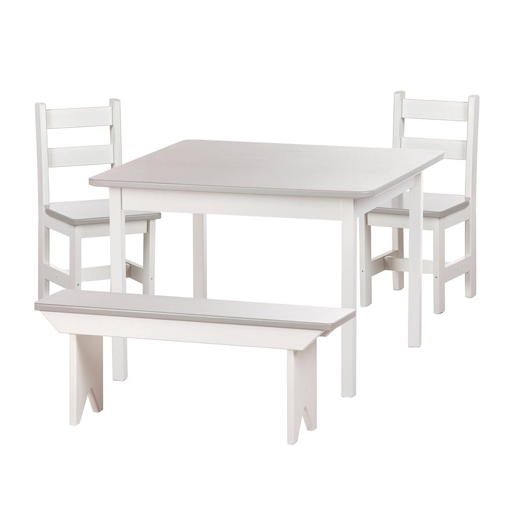 Kid's table and bench set in white with gray tops, two ladder-back chairs behind and a bench in front