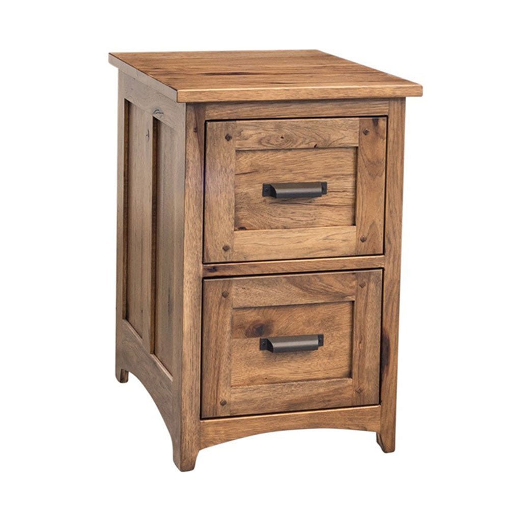 Rustic hickory two drawer file cabinet beside an L shaped writing desk with laptop and lamp in a home office