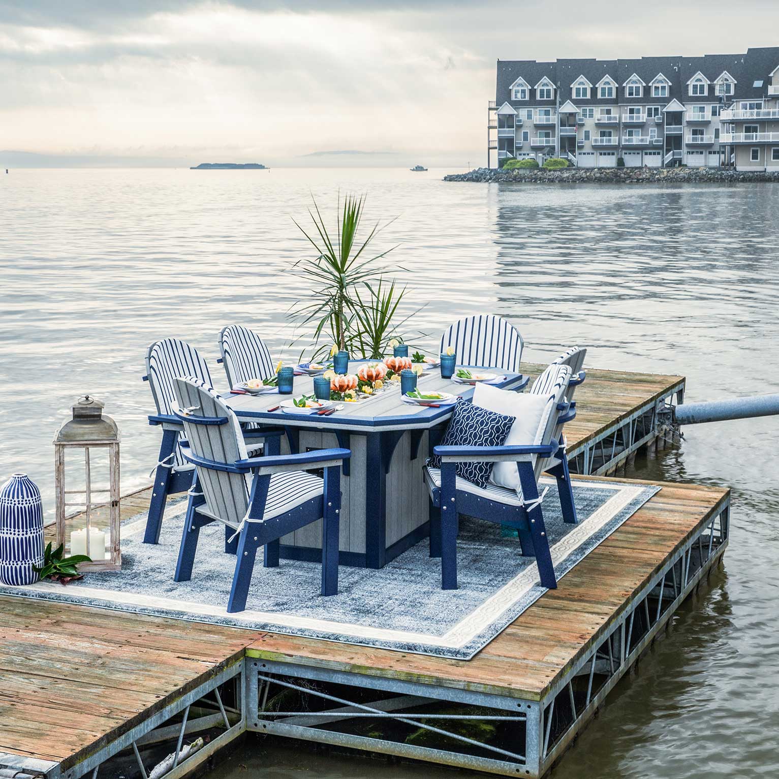 Amish Summerside Poly Patio Ice Bucket Dining Table shown in the back patio of a modern farmhouse home