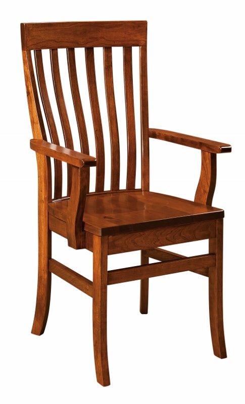 Cherry finished dining arm chair with a shaped slat back, wide flat arms and scooped wood seat on a white background