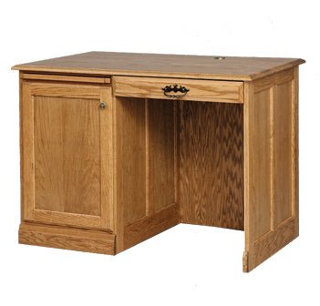 Compact oak flat top desk with a single pedestal door, center pencil drawer and paneled sides