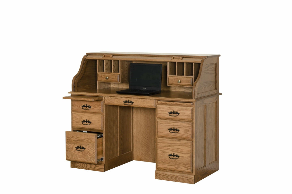 Angled view of the oak roll top desk with laptop, cubby drawers, side slide and an open bottom file drawer
