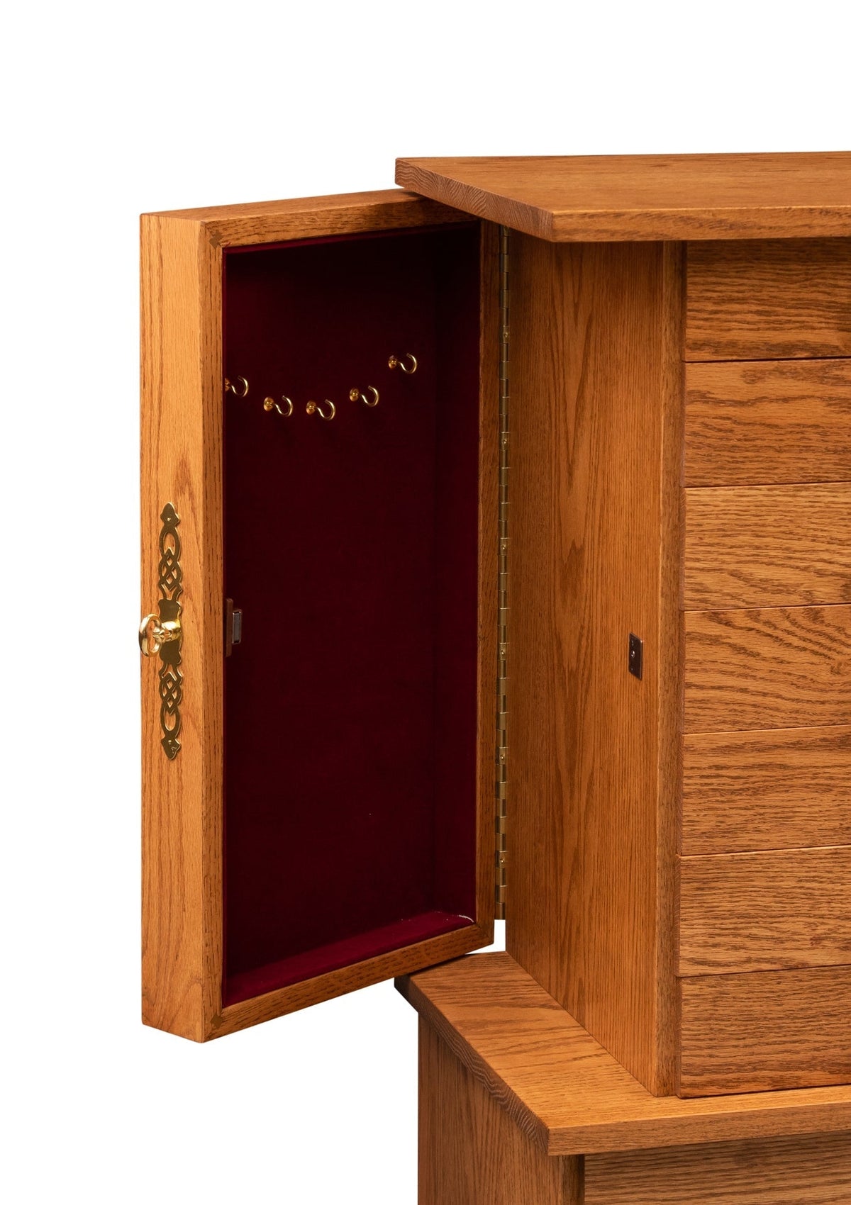Open oak side door on a jewelry chest showing brass necklace hooks on deep red velvet lining