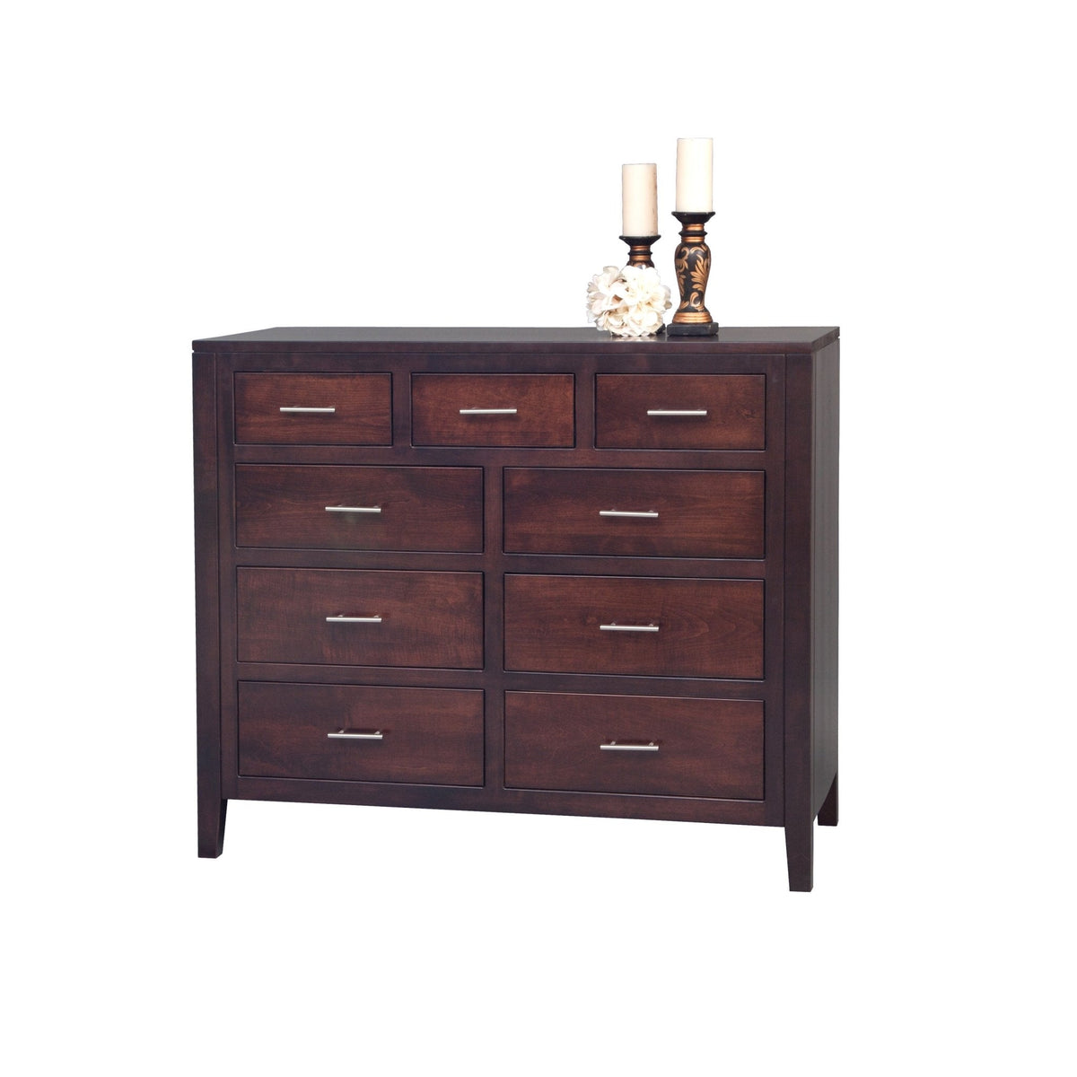 Dark cherry nine drawer high dresser with slim nickel pulls and tapered legs, styled with pillar candles on top