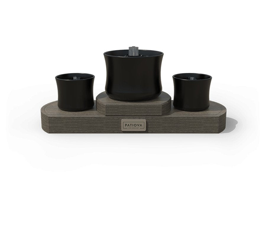 Front view of the three burner tabletop fire set with black ceramic bowls on a gray driftwood-toned poly stand