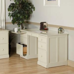 Cream painted flat top desk with six drawers, a pull-out writing slide, open file drawer and round wood knobs