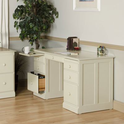 Cream painted flat top desk with six drawers, a pull-out writing slide, open file drawer and round wood knobs