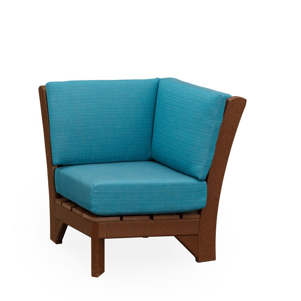 Armless corner section of a poly patio sectional in mahogany with teal cushions angled for an L configuration