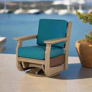 Weatherwood poly swivel glider chair with teal blue deep seating cushions on a patio overlooking a harbor