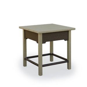 Square poly patio side table in weatherwood with a brown apron, plank top and dark metal stretcher bars on white