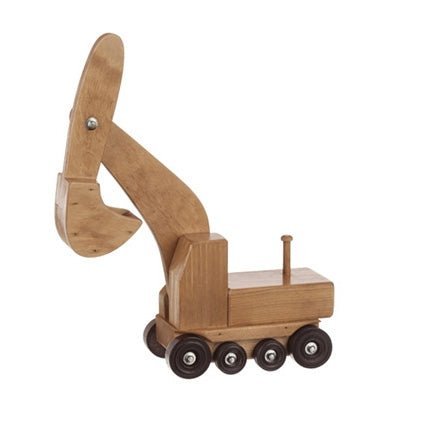 Toddler kneeling on a play rug swinging the black boom of a yellow painted wooden toy excavator in a bright playroom