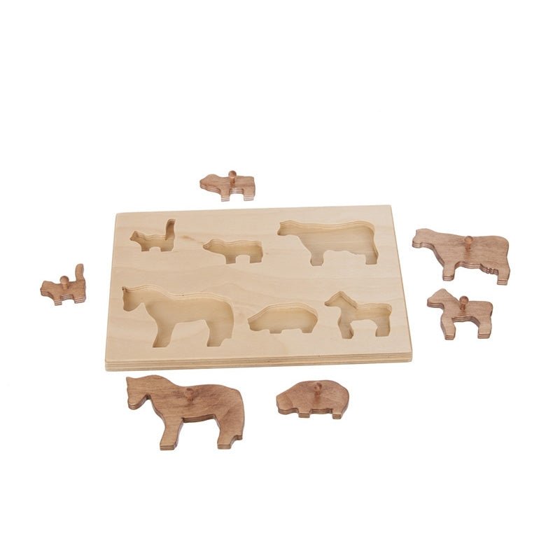 Birch farm animal puzzle board with cut-out slots and eight wooden animal pieces including a horse, cow, sheep and pig laid alongside