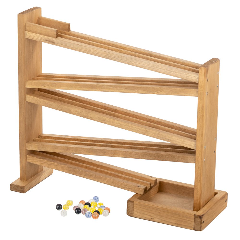Honey toned wooden marble racetrack with four zigzag ramps between posts and marbles collected in the base tray
