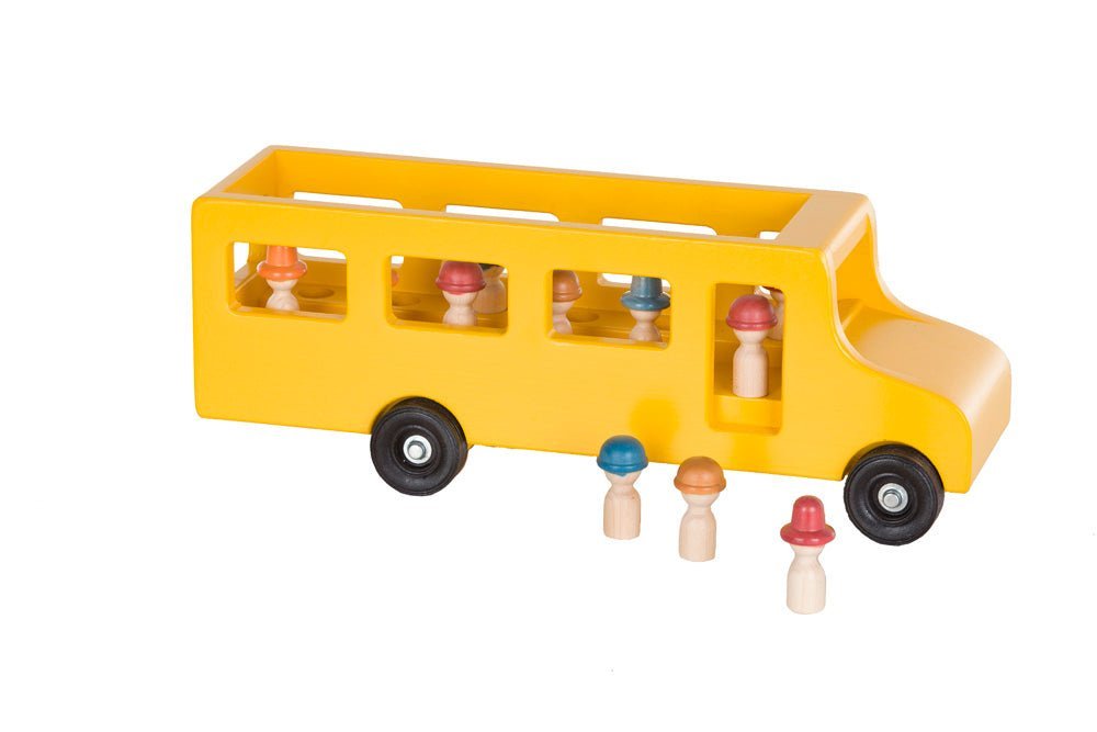 Yellow painted wooden toy school bus with cutout windows, rubber wheels and peg people passengers inside and out