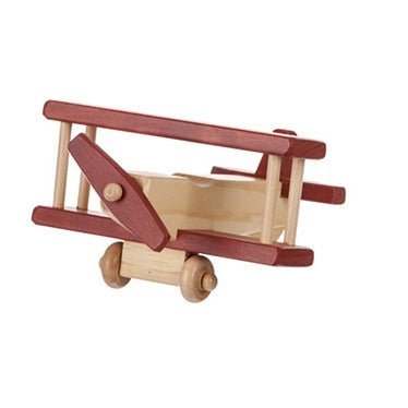 Small wooden toy biplane with double wings, wing struts, a turning propeller and two wooden wheels, natural stain