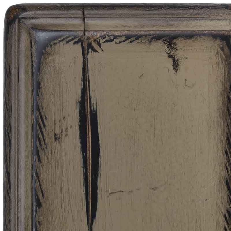 Close view of the Cracked Pepper antiqued maple swatch, gray-brown paint with dark rub-through along a check and corner nicks