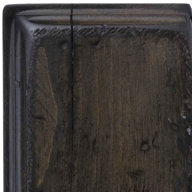 Antique Slate maple swatch detail, dark charcoal finish with faint gray-brown grain showing through and distressed corner nicks