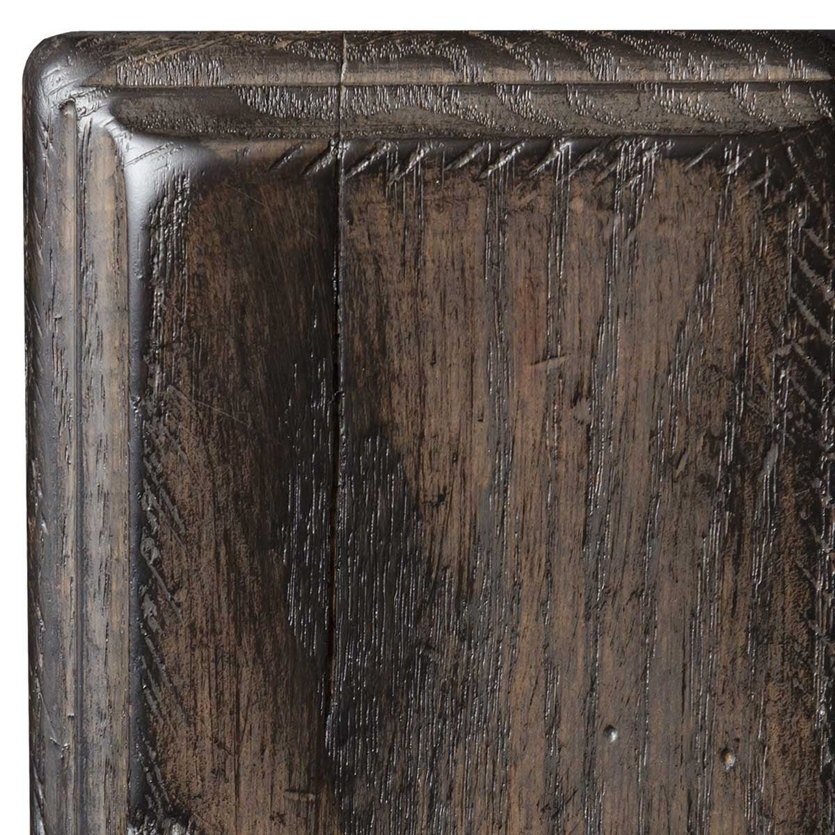 Smoke antiqued oak sample detail, deep smoky brown finish showing coarse grain and a distressed molded corner