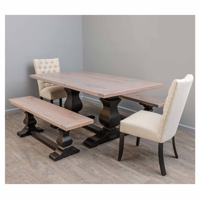 Trestle dining set with a weathered gray top, black bases, plank bench and two linen upholstered side chairs