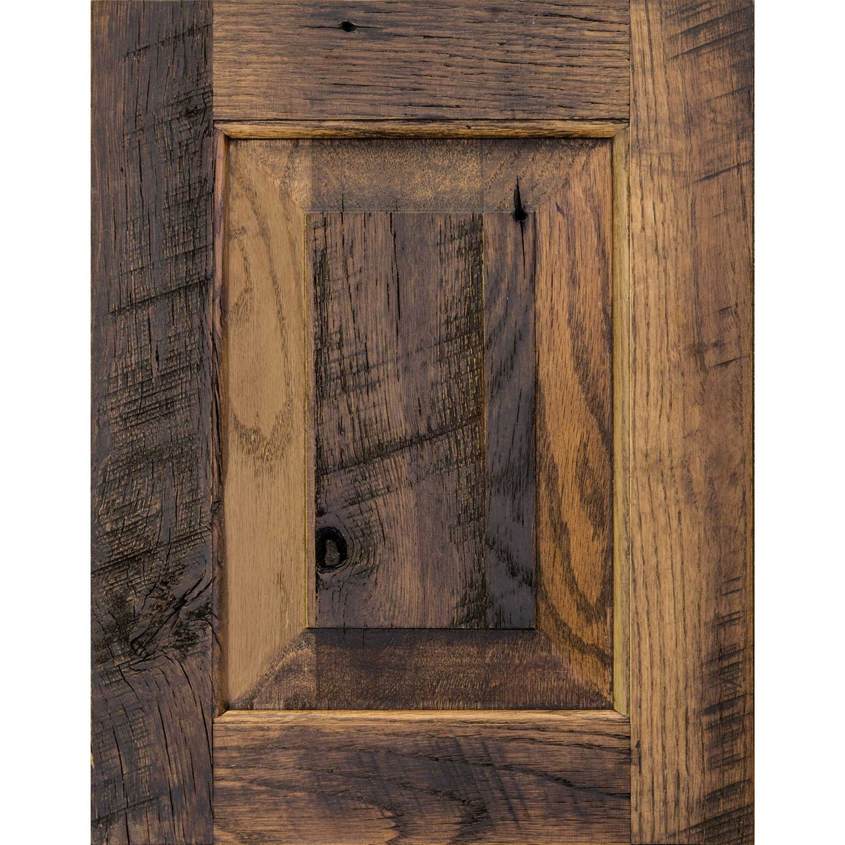 Cappuccino finish on oak barnwood cabinet door with rough sawn frame and a raised weathered panel