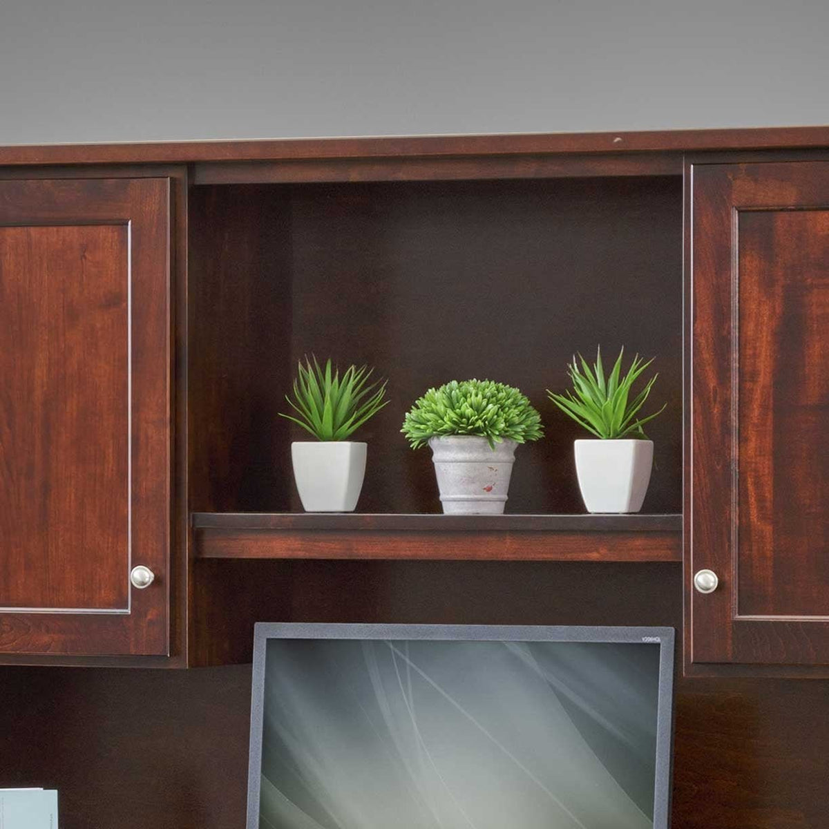 Detail of the desk pedestal with its door swung open to a CPU compartment and a sliding keyboard shelf above