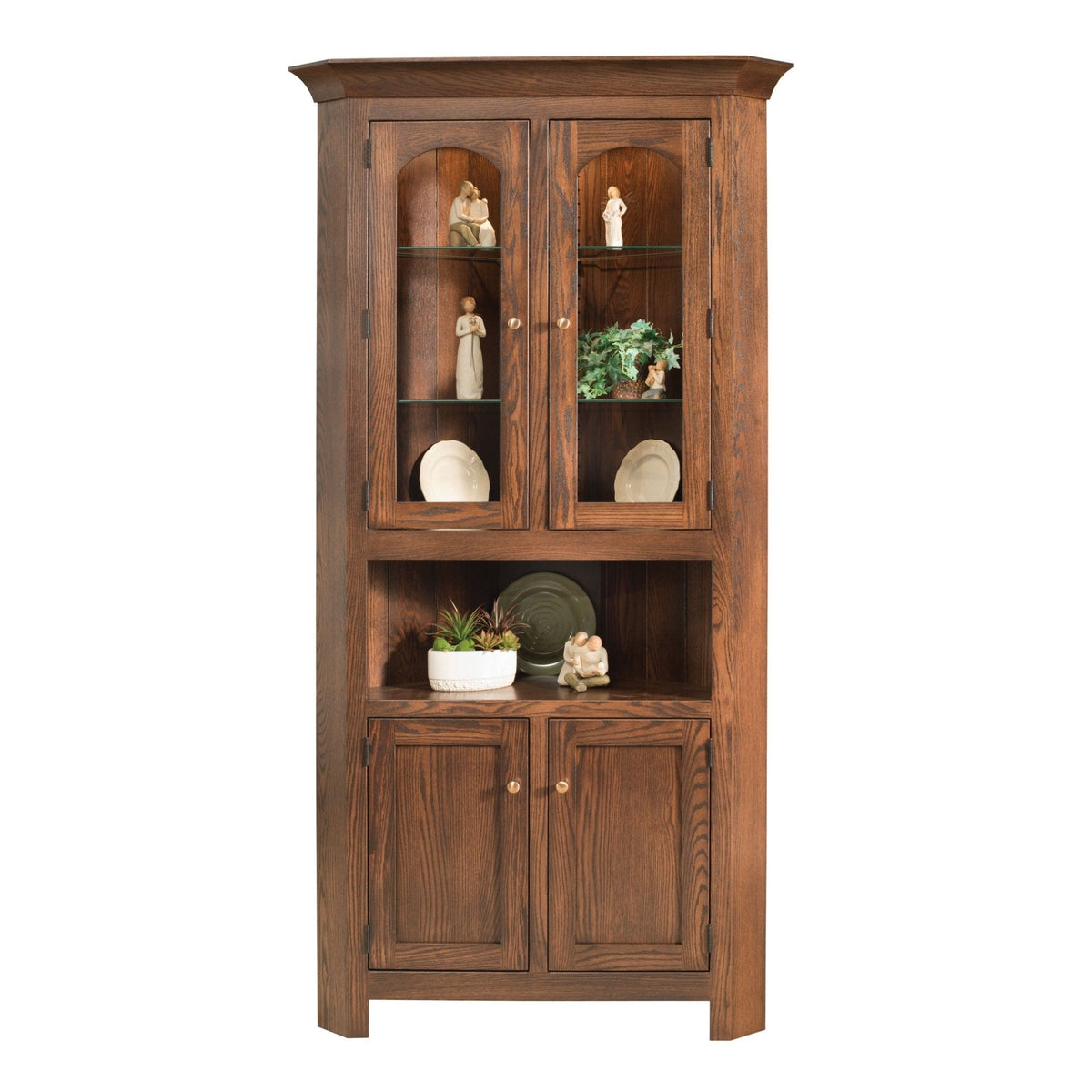 Oak corner china hutch with two arched glass doors, glass shelves of figurines, open display shelf and paneled base doors