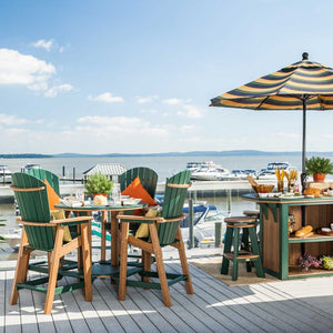Marina deck bar set with green and cedar Adirondack bar chairs, a poly serving bar and a striped market umbrella