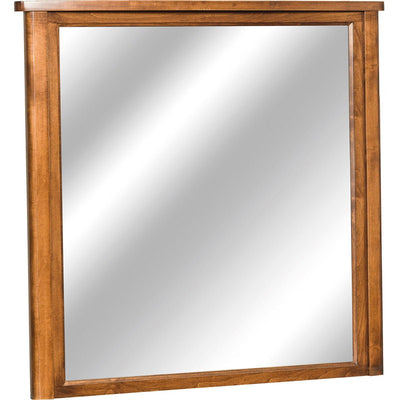 Rectangular dresser mirror with a simple wide maple frame and beveled edge on a white background