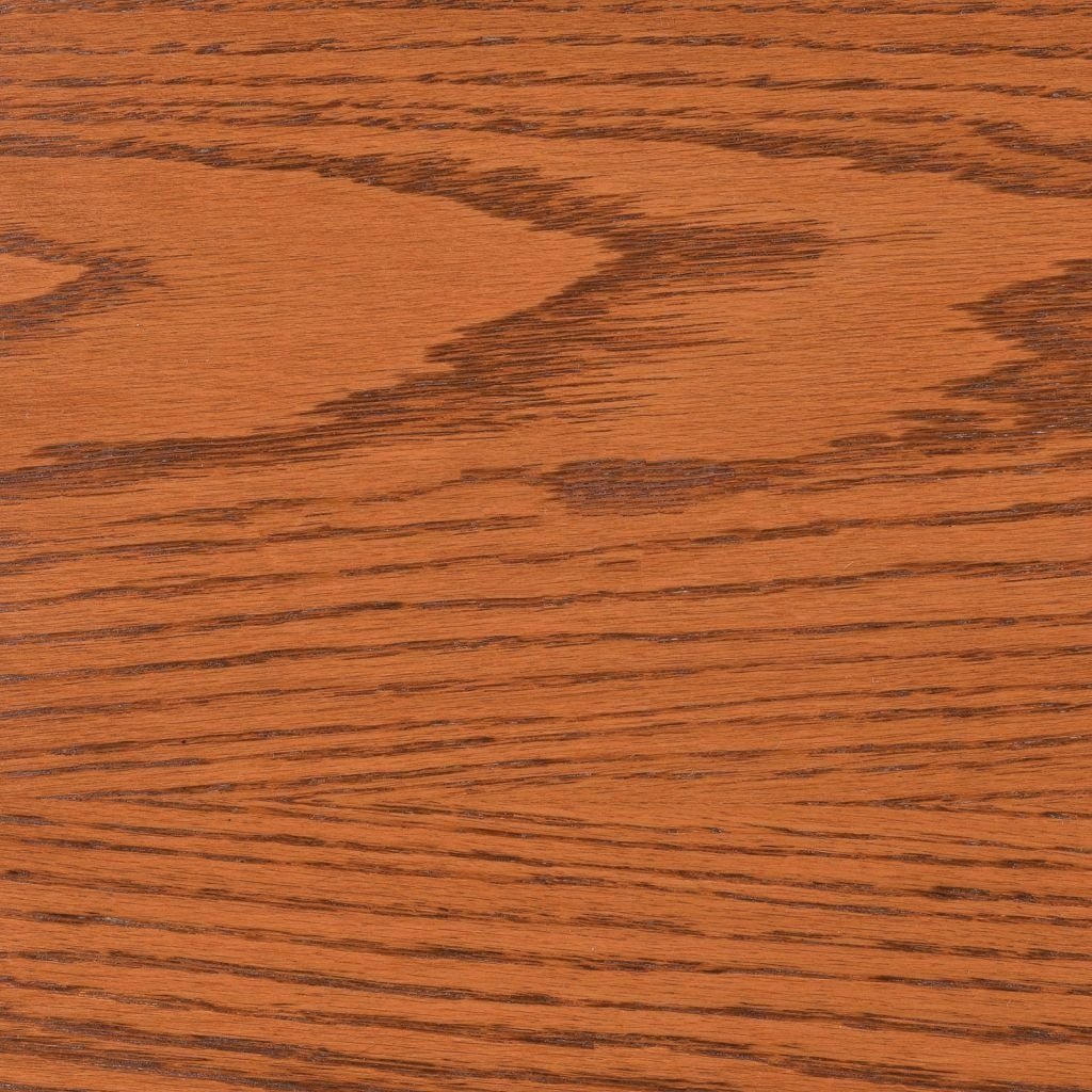 Harvest stain on oak, a bright golden orange brown swatch with bold dark cathedral grain