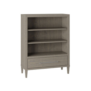 Gray finish kids bookcase with two adjustable shelves, a bottom drawer with chrome pull and tapered legs