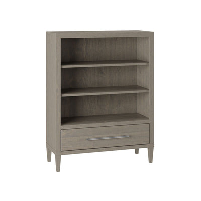 Gray finish kids bookcase with two adjustable shelves, a bottom drawer with chrome pull and tapered legs