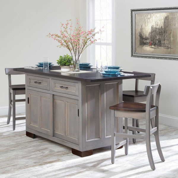 Gray painted kitchen island with dark plank drop leaf top, two drawers, sliding doors and three stools