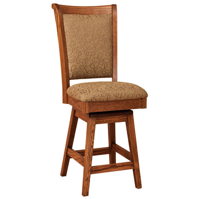 Oak swivel bar stool with tan embroidered fabric back and seat, footrest stretchers and splayed legs