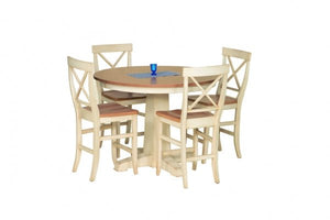 Round pedestal counter height table with a cream painted base, natural wood top and four X back stools