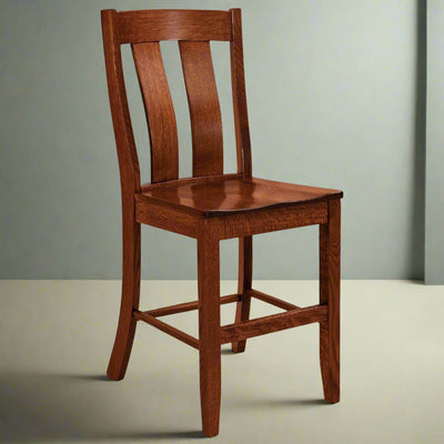 Quartersawn oak bar chair with two wide curved back slats, scooped seat and footrest stretchers