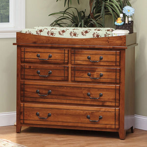 Cherry changing dresser with removable tray top and monkey print pad, four small over two wide drawers with black bail pulls