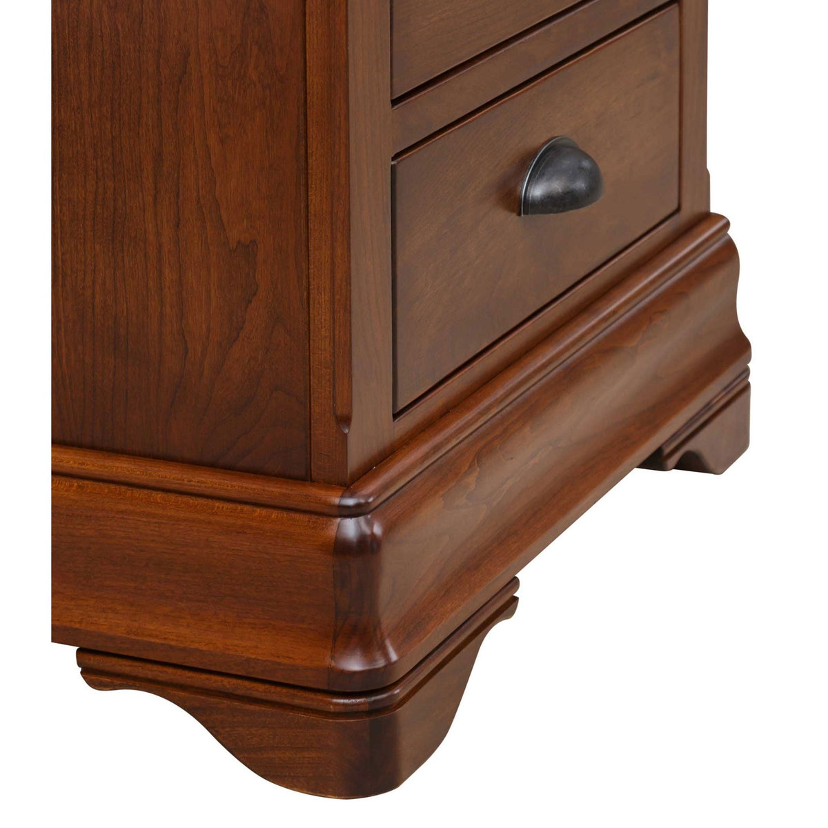 Bracket foot and ogee base molding close-up on the cherry dresser with a cup pull above