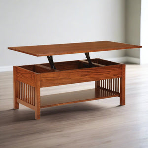 Oak Mission lift top coffee table with the top raised on gas struts to reveal storage, slat sides and bottom shelf