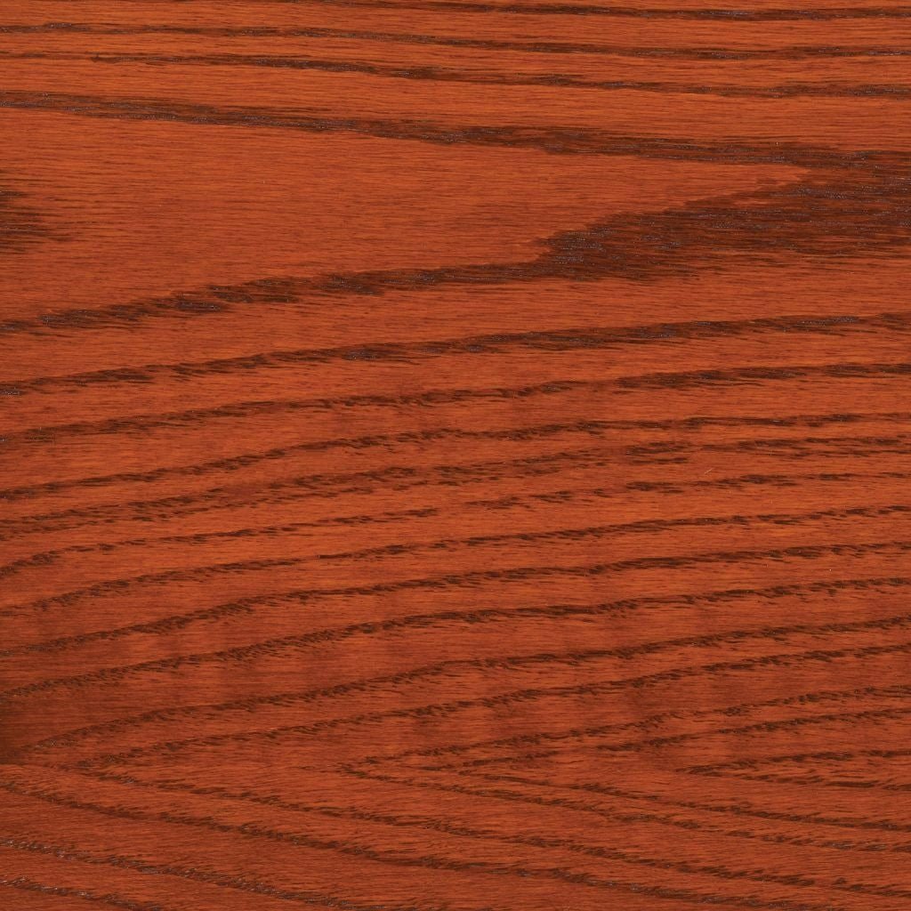 Mission stain on oak, a red brown swatch with bold cathedral oak grain sweeping across