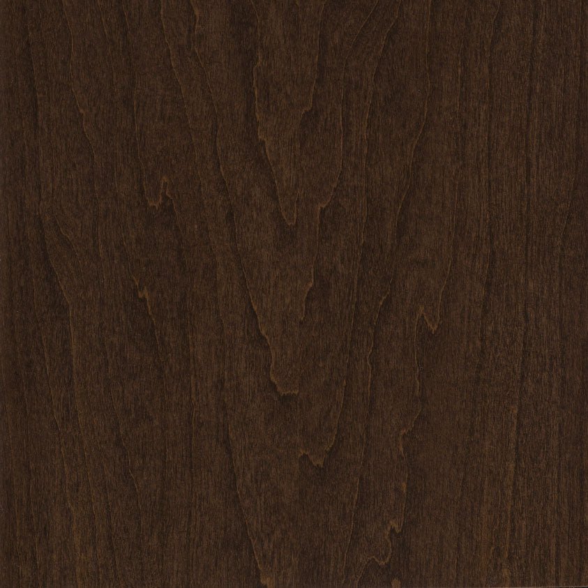 Cocoa stain on cherry sample showing a deep chocolate brown finish with wavy cathedral grain