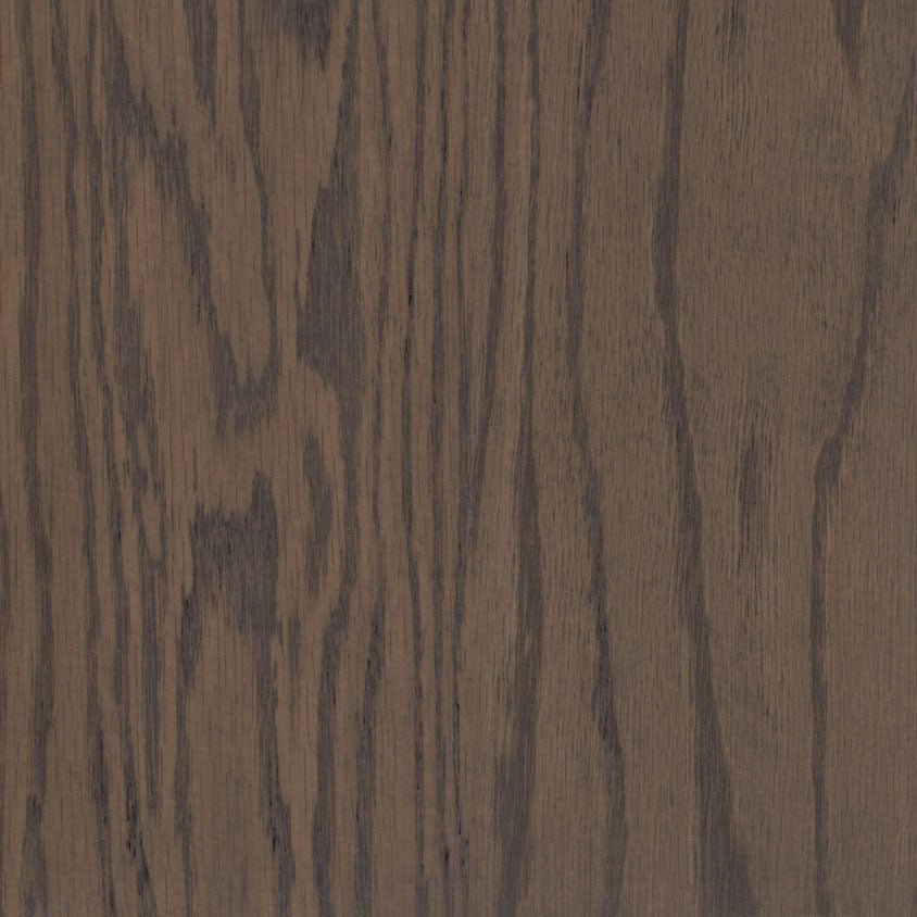 Driftwood stain on oak, a gray brown swatch with strong dark oak grain lines and a weathered tone