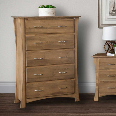 Five drawer chest with flared curved sides in a light brown maple, staged next to a matching nightstand